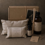 Load image into Gallery viewer, Lavender eye pillow, essential oils, and diffuser with branding on a brown background - Lavender gift set
