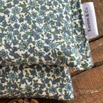 Load image into Gallery viewer, Floral fabric with a 'Kasten &amp; Co' label on a wooden surface
