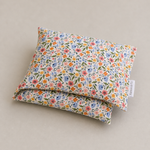 Load image into Gallery viewer, Floral-patterned lupin heat pillows on a beige background

