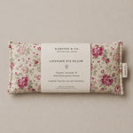 Load image into Gallery viewer, Floral-patterned lavender eye pillow handmade in Australia with Karsten &amp; Co. packaging on a beige background

