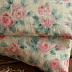 Load image into Gallery viewer, Floral patterned fabric with pink flowers on a beige background
