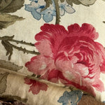 Load image into Gallery viewer, Lupin Heat Pillow - Close-up of floral fabric with pink rose and blue flowers on a beige background
